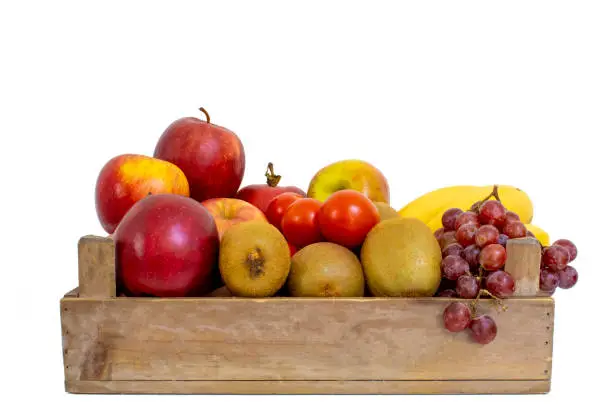 Photo of Wooden box with fruit and vegetables