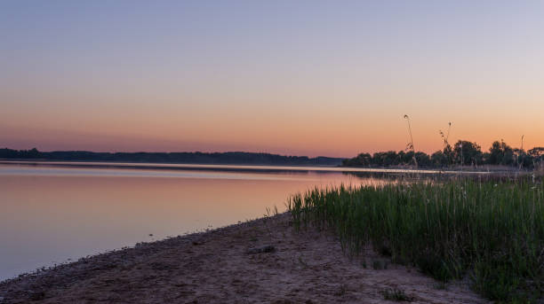 istock beautiful sunset on the lake 1167212060