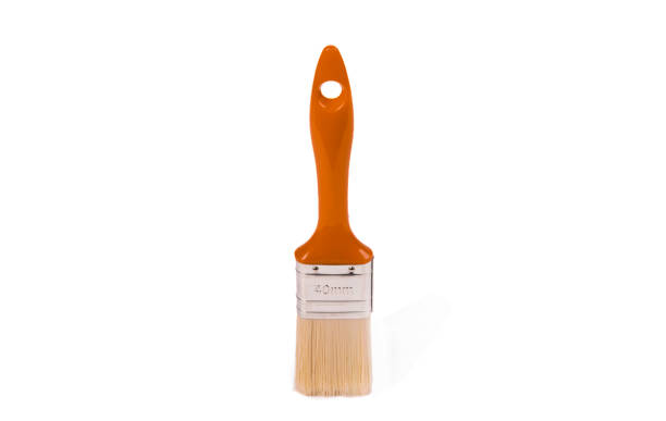 istock brush with orange plastic handle on a white background, top view 1167212101