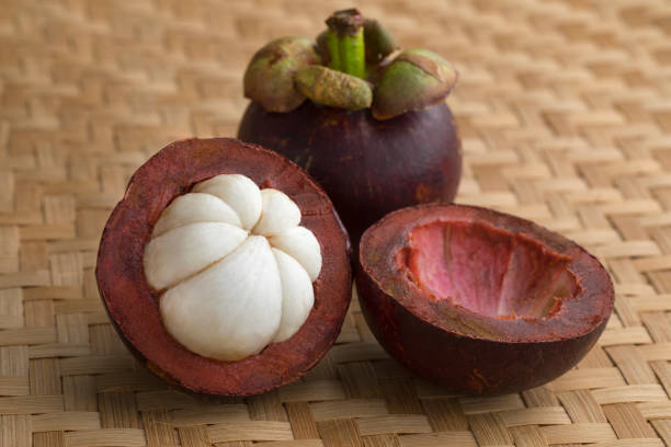 istock Fresh ripe peeled mangosteen fruit 1167213075