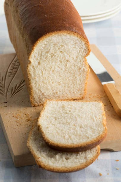 istock Fresh baked white bread cut into slices 1167213156