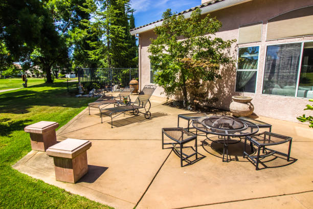 Lounge Chairs And Fire Pit On Outdoor Patio