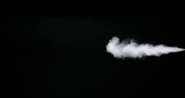 istock White Smoke Trail Isolated on Black Background 1167214643