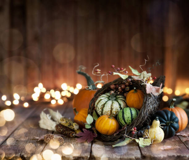 istock Autumn Thanksgiving Cornucopia on a Wood Background 1167214753