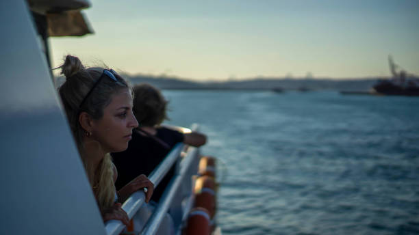 istock woman watching landscape from boat 1167215719