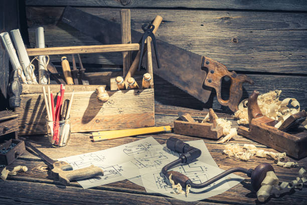 istock Drawing desk in carpenter workshop on rustic wooden table 1167216816