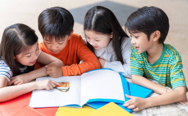 istock Asian Kid Read Book Together, Education Concept 1167216940