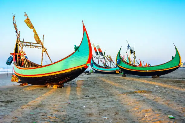 Wooden traditional fishing boat on a Teknaf, Coxbazar Sea Beach of Bangladesh