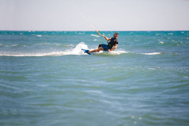 Doha, Qatar-February 14,2016 Kiteboarding on the waters of an artificial island called “The Pearl” on the occasion of National Sports Day in Qatar.