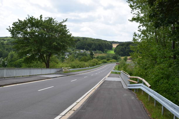 istock road across retaining wall of Freilinger See 1167224282