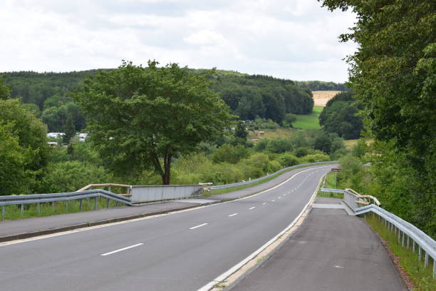 istock road across retaining wall of Freilinger See 1167224504