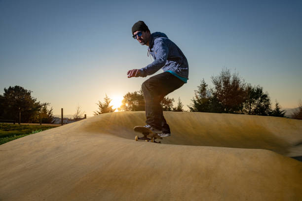istock Skateboarder on a pump track park 1167231186