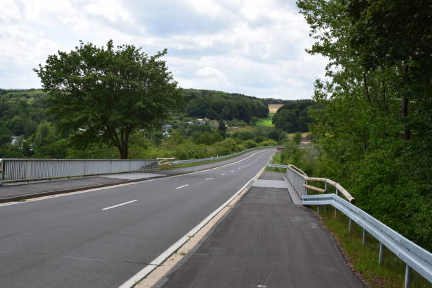 istock country road across dam 1167233401