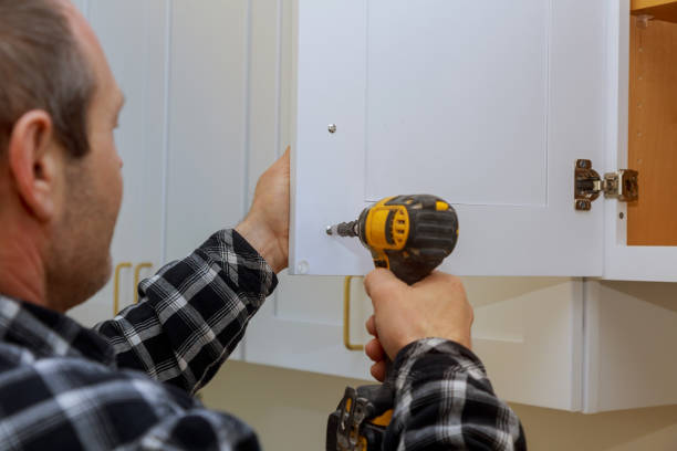 istock The installing a furniture handle process of assembling cabinet 1167234239
