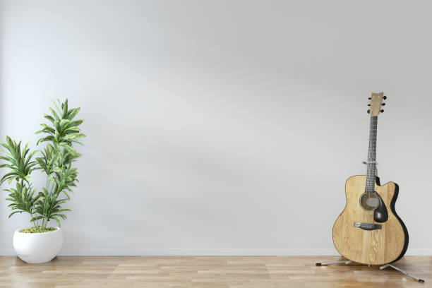 istock Empty room zen minimal design with guitar and plants on floor wooden empty room .3D rendering 1167238111