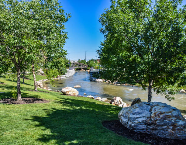 Scenic waterway in downtown Caldwell Idaho Scenic waterway through downtown Caldwell, Idaho. Forty years ago, this waterway was mostly covered over and was virtually a sewer. Now it is the centerpiece of a revitalized city. idaho stock pictures, royalty-free photos & images