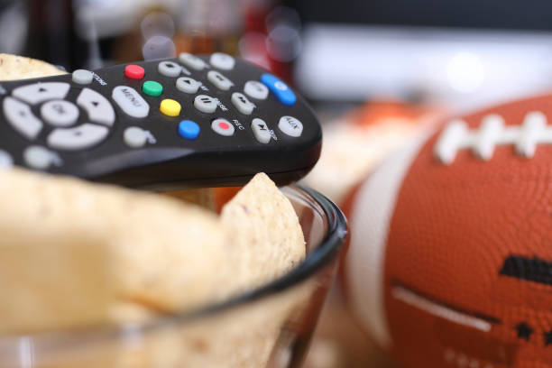 istock Watching the football game with snacks. 1167241545