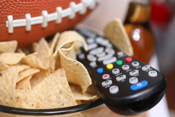 istock Watching the football game with snacks. 1167241554