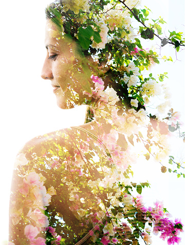 Double exposure with an ecological concept showcasing the beautiful femine nature of pink and white Bougainville flowers