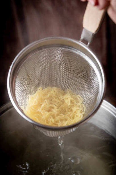 boiled japanese ramen noodle in strainer