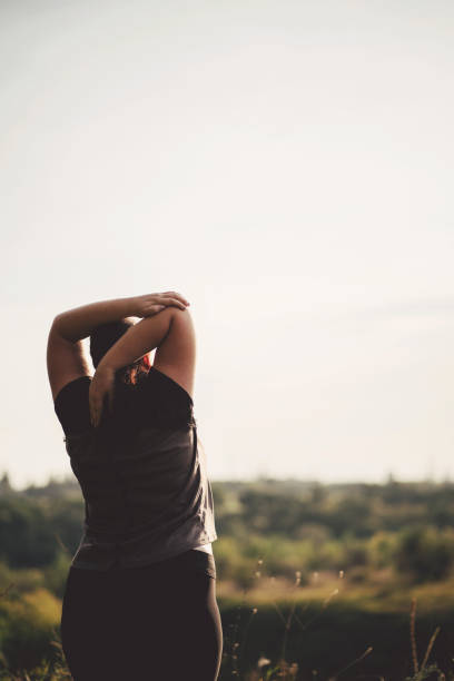 istock Overweight woman stretching hands during walk 1167244661
