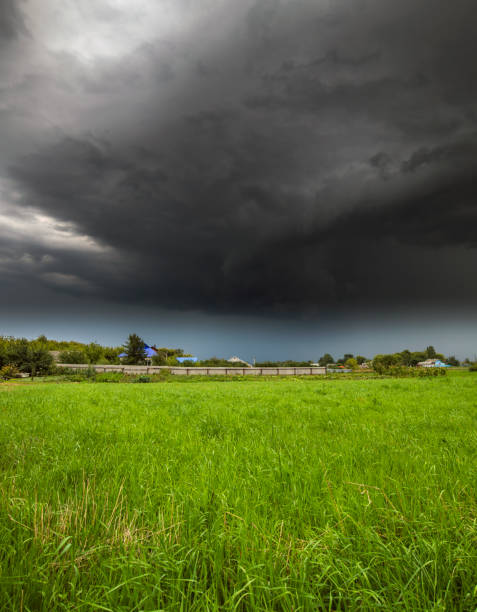 istock The Summer countryside landscape with a storm cloud 1167245081