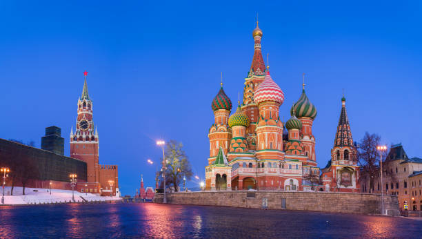 istock Saint Basil's Cathedral and Kremlin's clock in Moscow 1167245284