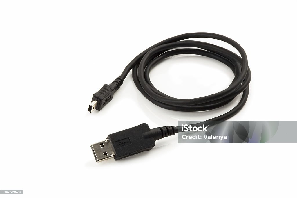 usb cable with mini-usb laying on a white background  Cable Stock Photo