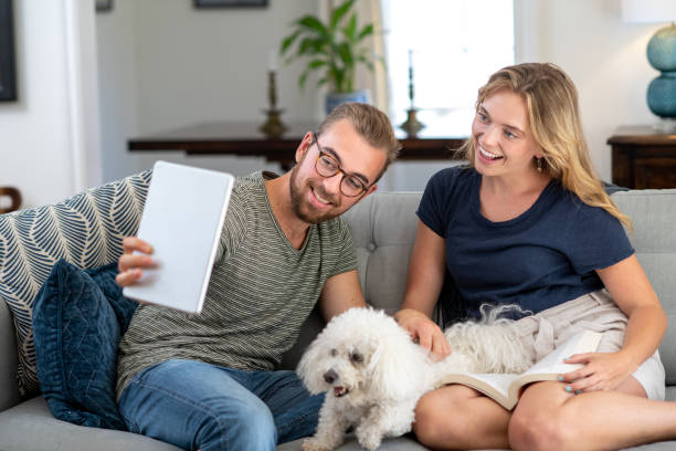 istock Husband and Wife Take a Selfie with their Dog 1167246879