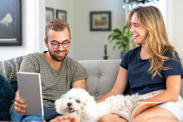 istock Husband and Wife Take a Selfie with their Dog 1167248018