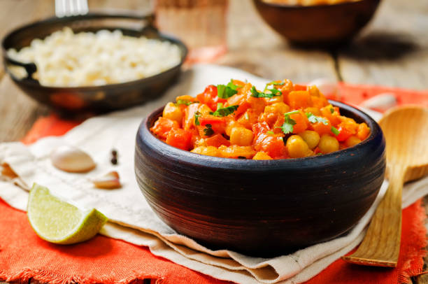 istock chickpeas carrots pepper coconut milk curry with brown rice 1167248899