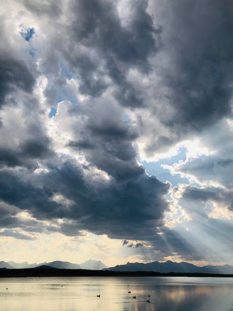 istock Dramatic sunset with sunbeams over the Rocky Mountains 1167250401