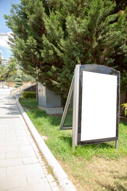 istock advertising board on asphalt road 1167250709