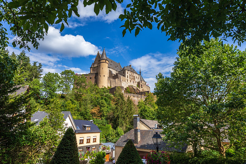Vianden, Luxembourg - August 8, 2019: Medieval Castle Vianden, top of the mountain Luxembourg or Letzebuerg. Castle Vianden is one of the largest and finest feudal residences of the Roman and Gothic eras in Europe.