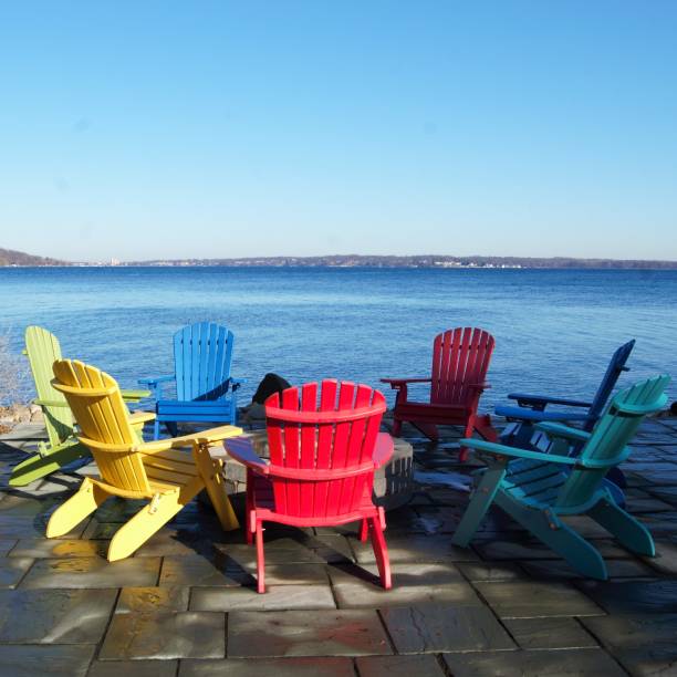 istock Colorful Chairs on a Winter Shore 1167254968