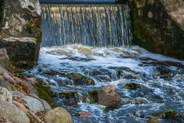 istock Small Water Cascade In The City Park. 1167257402