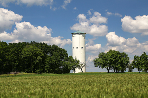 Water tower on cultivated land in Germany.