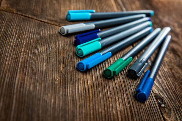 istock Art supplies on retro old wood background 1167260679
