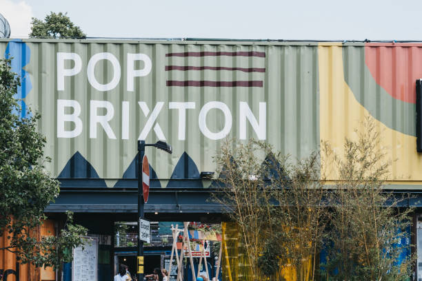 Entrance to Pop Brixton, London, UK. London, UK - July 16, 2019: Entrance to Pop Brixton, event venue and the home of a community of independent retailers, restaurants, street food startups and social enterprises. brixton photos stock pictures, royalty-free photos & images