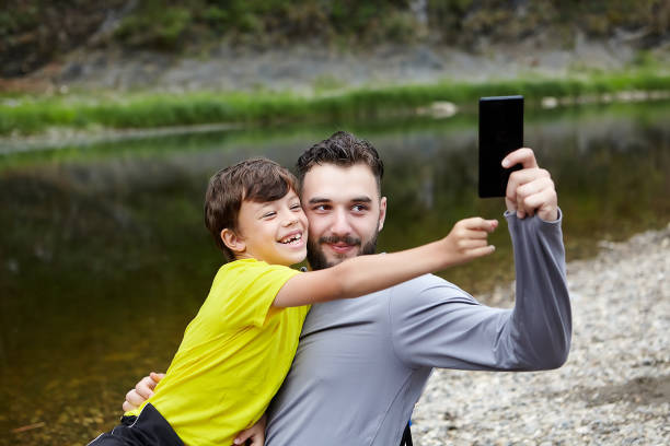 istock Dad and son in nature on fathers day. 1167266967