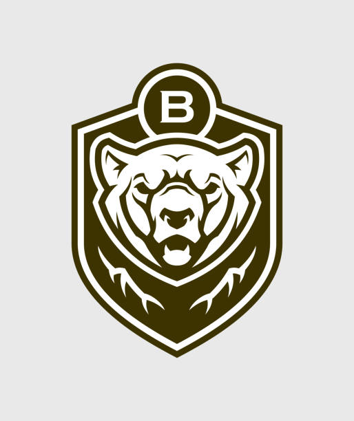 Bear head silhouette. Bear face vector emblem. Bear head outline silhouette. Bear face on a shield - stylized vector emblem. bear face stock illustrations
