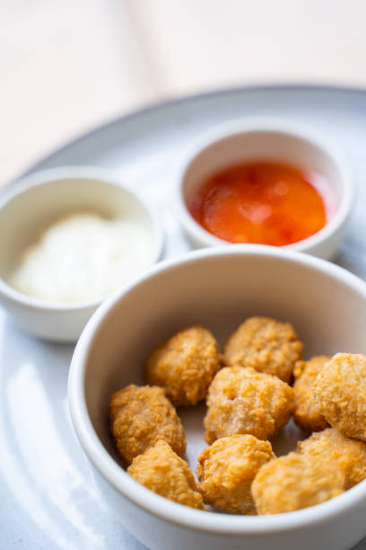 istock deep fried chicken nuggets with spicy sauce 1167289913