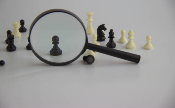 istock the figure is viewed through a magnifying glass 1167296718