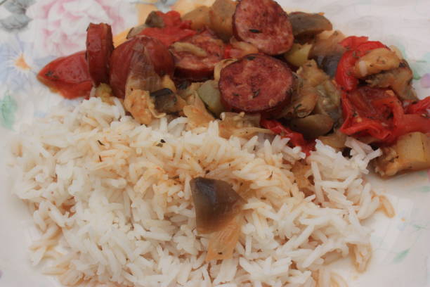 istock Ratatouille cooked with sausage and served with basmati rice 1167297487