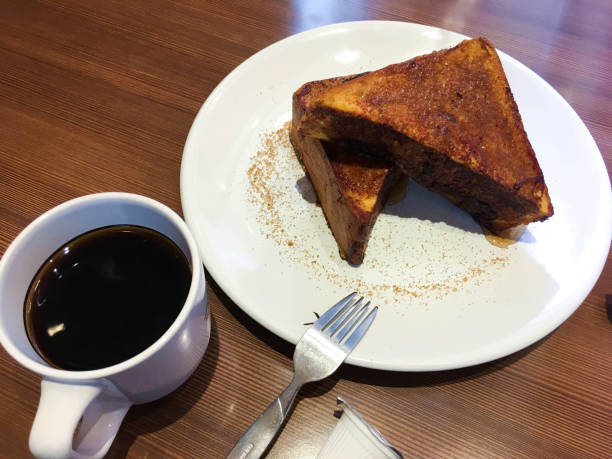 istock Stack of french toast and coffee 1167301060