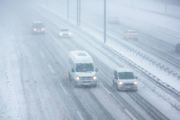 istock Traffic On highway During Snow Storm 1167302673
