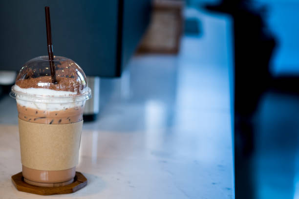 istock Iced coffee mocha with foam milk in takeaway cup 1167304378