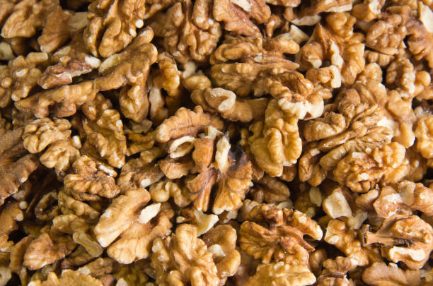 istock Walnuts sold in spice market. Walnuts Help Lower Cholesterol. Good grains eat healthy. 1167304493