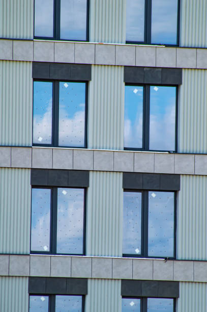 istock Mirrored reflective windows of the building. 1167306638