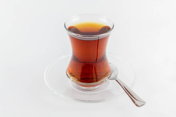 istock glass of Turkish tea isolated on white 1167307233
